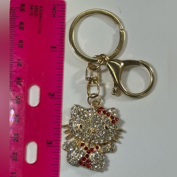 BAG CHARM Hello Kitty Gold Tone Blue Crystal Hair Bow Bag Charm Keychain - Picture 4 of 7
